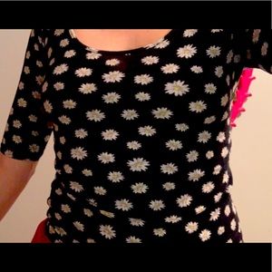 Mid-length black top with small daisies